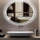 How to choose an oval mirror with backlight for the bathroom?