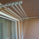 Liana for drying clothes on the balcony: varieties and installation instructions