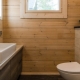 Arrangement of a bathroom in a wooden house