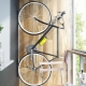 Features and methods of storing a bicycle on the balcony