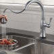 Kitchen faucets with pull-out watering can: features and selection