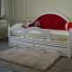 Children's ottoman bed with soft back: description, types, selection tips