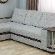 Sofa with a table in the armrest: features and choice