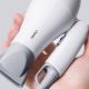 Travel hairdryers: varieties, choice, use