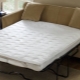 Orthopedic mattress cover on a sofa: characteristics, types, care and choice