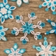 How to make snowflakes using quilling technique?