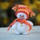 How to tie a snowman amigurumi?