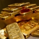 How much does an ounce of gold weigh and where is it used?