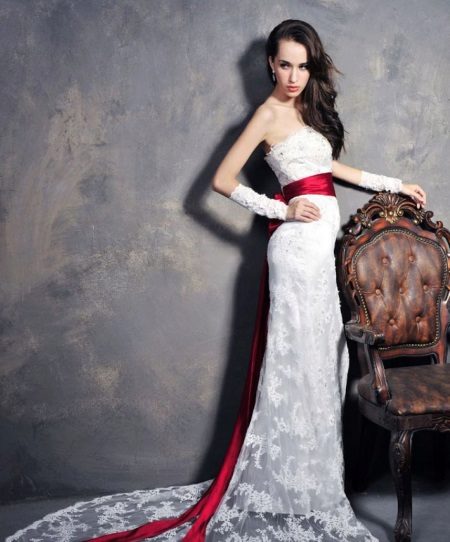 Lace wedding dress with a long belt