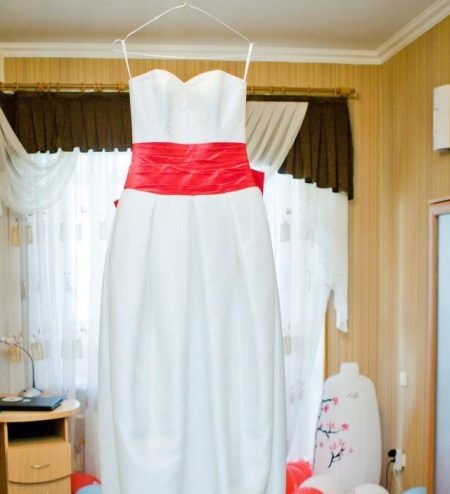 Wedding dress with a pink belt