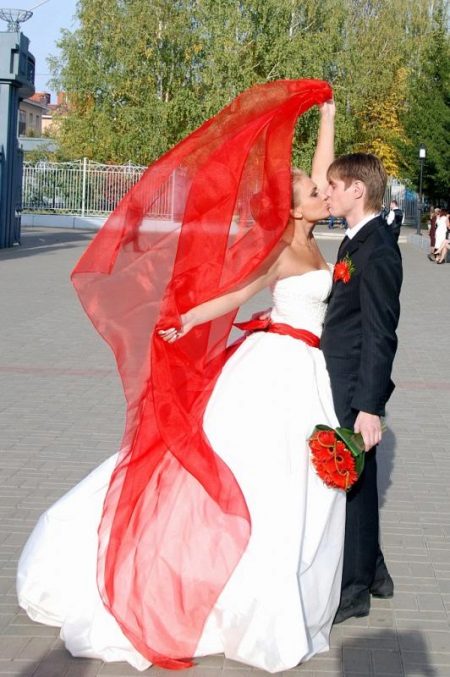 Red veil with a dress with a red belt