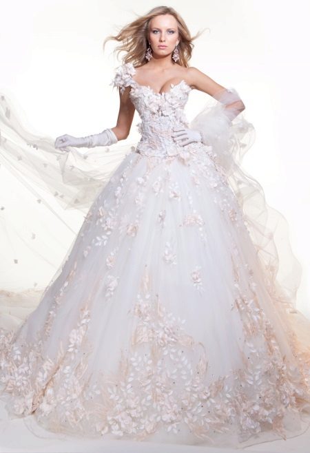 Wedding dress with floral applique by Oksana Mukha