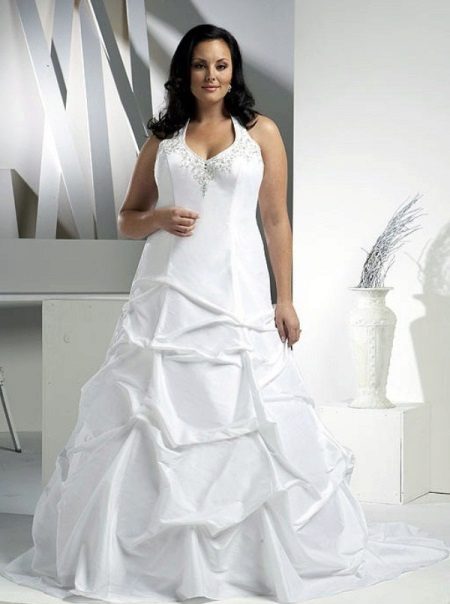 Lush wedding dress with a decorated bodice and skirt
