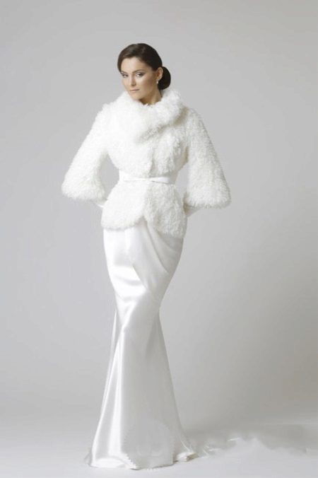 Wedding dress with a fur coat for a wedding