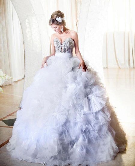 Wedding dress with a full skirt and flowers
