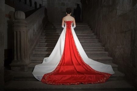 wedding dress with a red element on the back