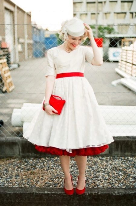 Stylig style wedding dress with red accessories