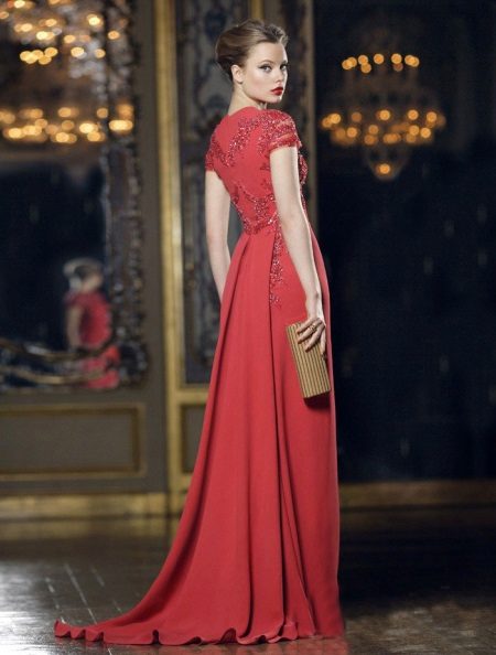 Red evening dress with a train
