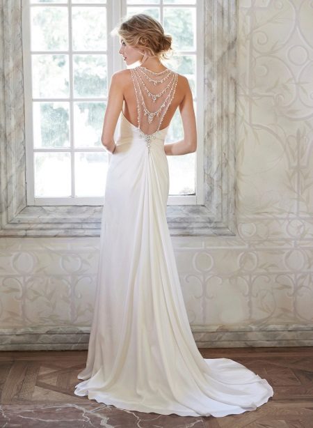 Straight back wedding dress with a train and an open back