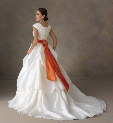 Wedding dress with an orange belt