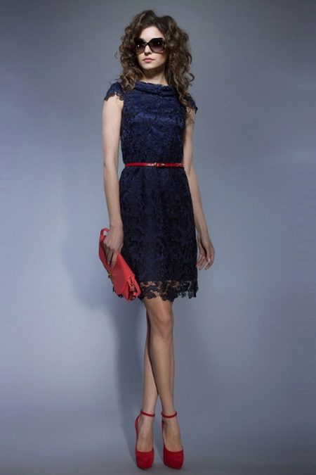 Navy dress with red accessories