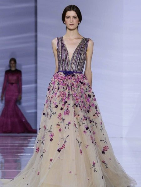 Evening dress with flowers on a skirt