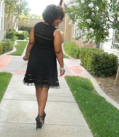 Black office dress for the full and high-heeled shoes for him