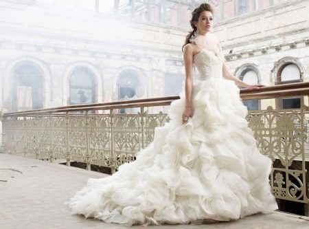 Wedding dress with flounce skirt with a train
