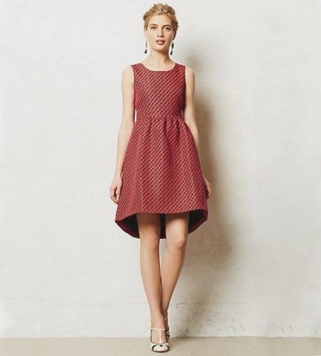 Dress with an asymmetrical hem bell skirt