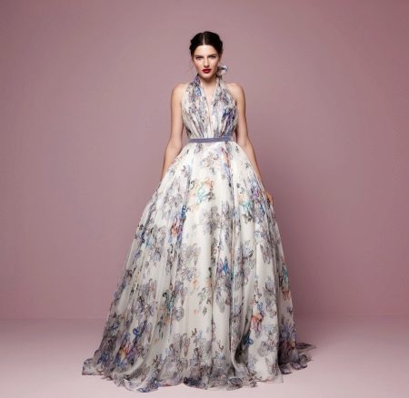 The fitted dress is magnificent on a floor