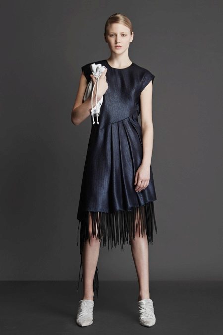 Fitted black dress with fringe
