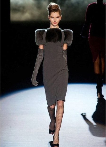 The fitted dress is knitted