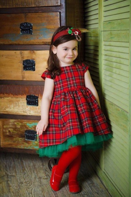 Elegant dress for the girl in a cage