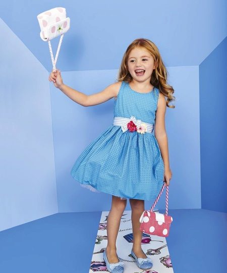 Cocktail dress for a girl with a belt