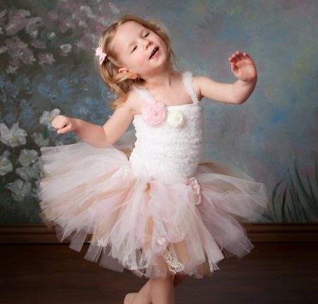 Knitted top on a dress for a girl from tulle