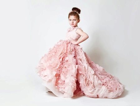 Chic ball gown for a girl with a train