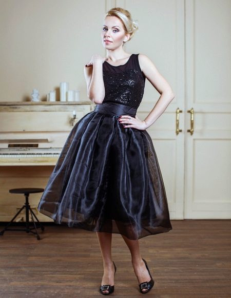 Black organza bell skirt combined with a black top